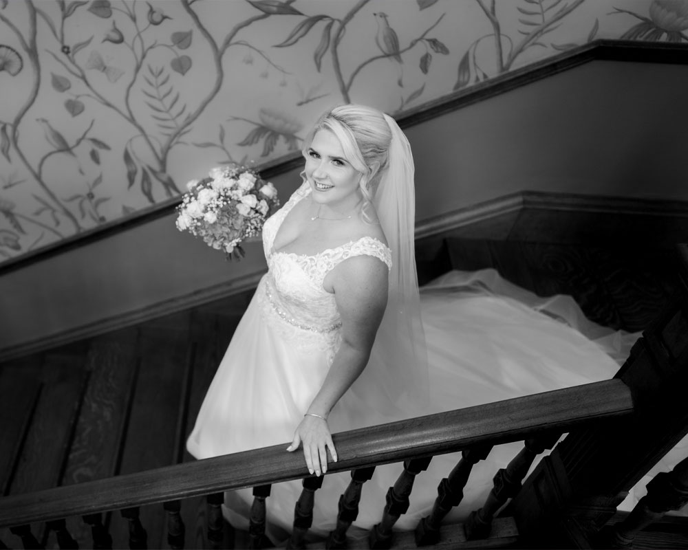 Bride portrait on stairs.