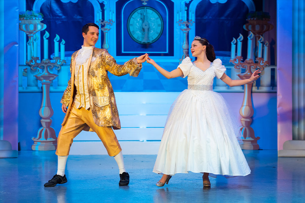 Theatre photography, pantomine. Cinderella and Prince Charming dancing.