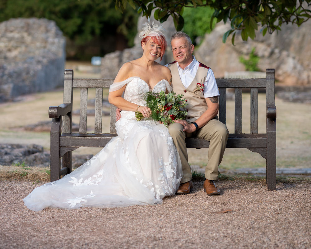 Bride and groom pose at Torre Abbey, Torquay.