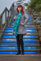 Portrait photo at on the blue lit steps at Rock walk in Torquay, Devon.