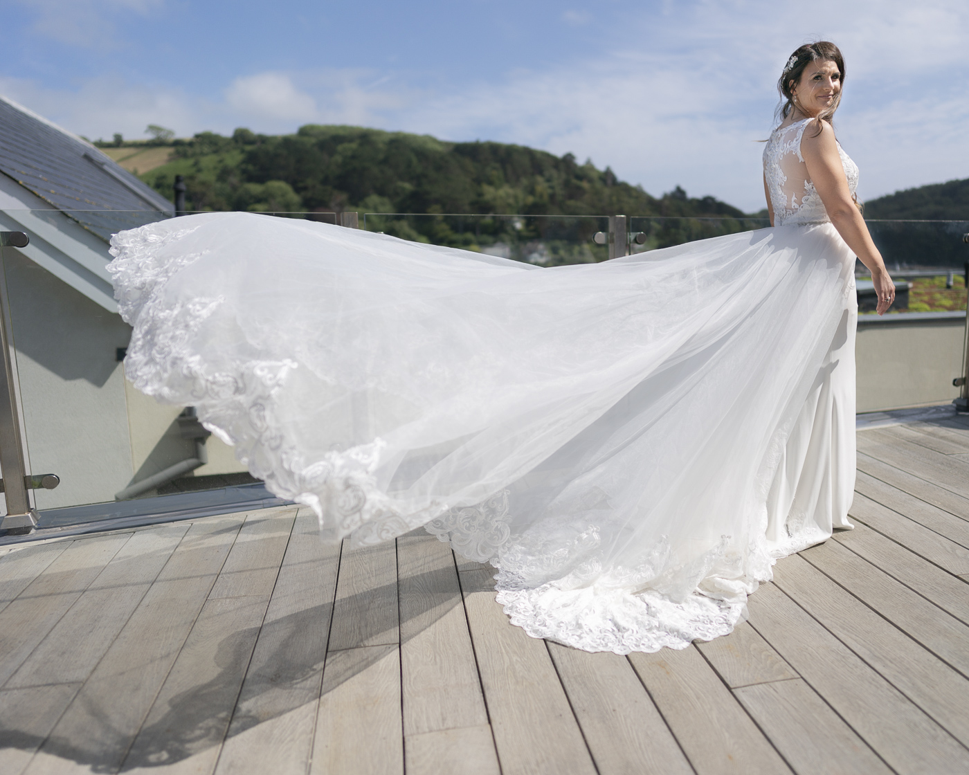 Bride with flowing wedding dress